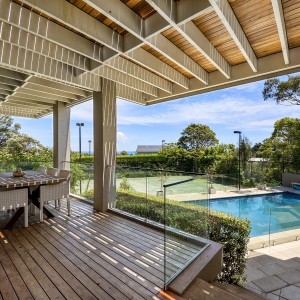 decking, swimming pool and tennis court