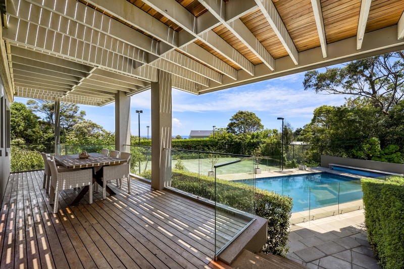 decking, swimming pool and tennis court