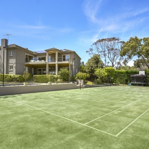 house with tennis court