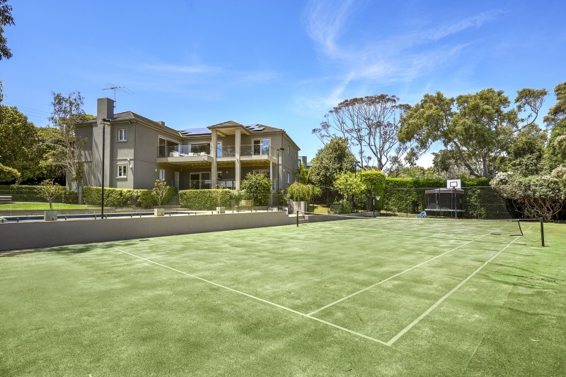 house with tennis court