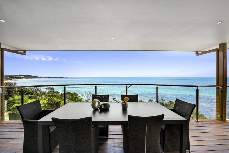 balcony with view of ocean