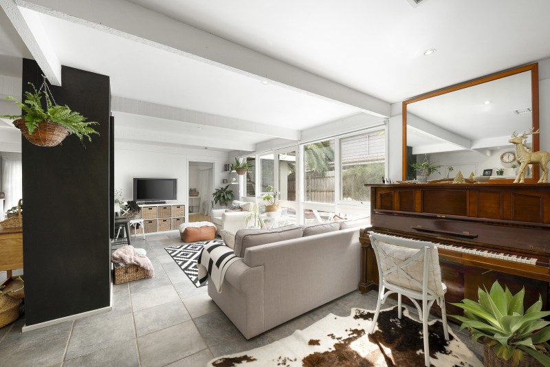 lounge area with piano