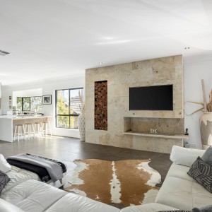 lounge area with tv and cowhide