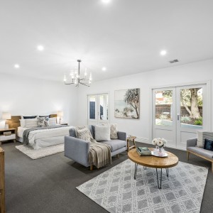 bedroom with lounge area