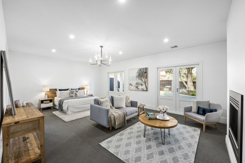 bedroom with lounge area