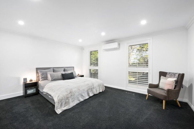 carpeted bedroom