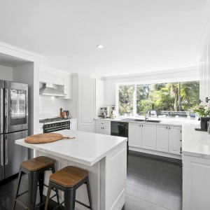 white kitchen with breakfast bar