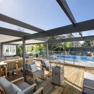 backyard with dining and lounge on decking